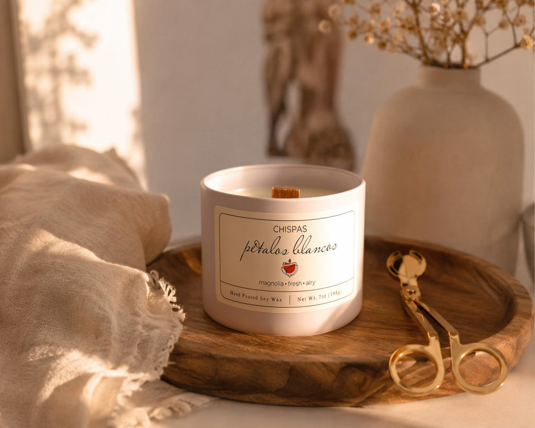 Lit wood wick coconut soy candle on a warm minimal table setting