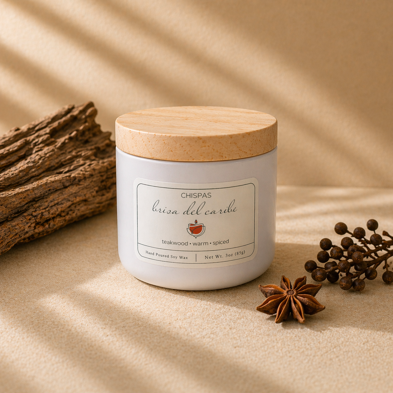 Brisa del Caribe candle by Chispas with a wooden lid, styled on a warm neutral surface with subtle spiced accents.